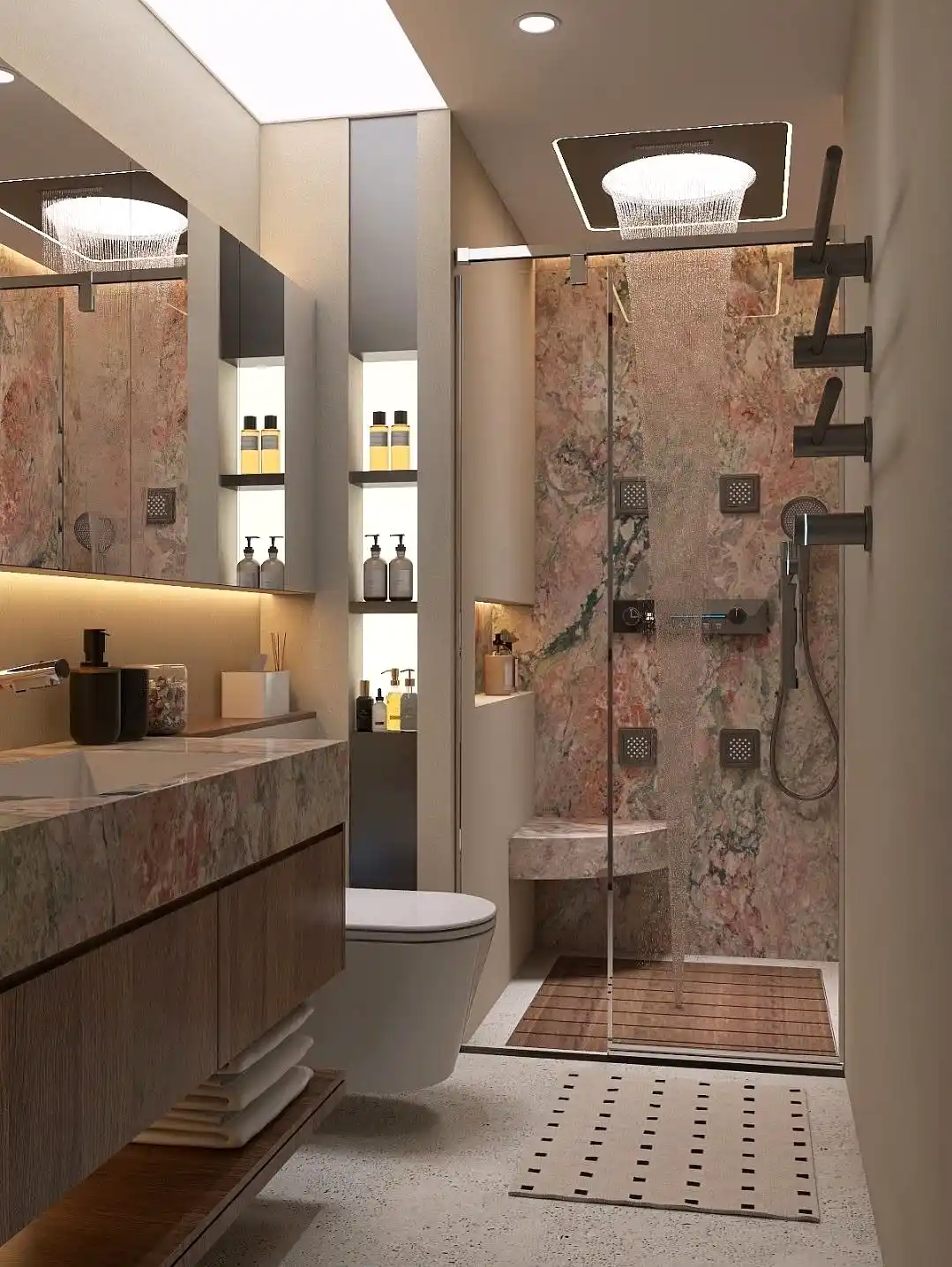 This luxurious bathroom remodel features stunning rose-veined marble walls and a frameless glass walk-in shower with a rainfall ceiling fixture and multi-jet body sprays. A floating wood vanity with LED-lit niche shelving adds warmth, while a wooden shower mat and terrazzo floor bring natural texture. Perfect example of high-end bathroom renovation.